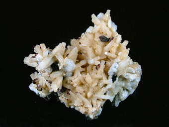 Natrolite, Analcime, Rhodochrosite and Aegirine - Poudrette quarry (Demix quarry; Uni-Mix quarry; Desourdy quarry; Carri�re Mont Saint-Hilaire), Mont Saint-Hilaire, La Vall�e-du-Richelieu RCM, Mont�r�gie, Qu�bec, Canada