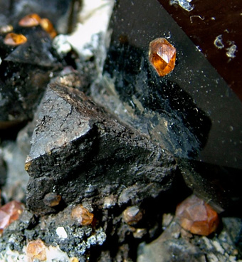 Helvine, Spessartite and Quartz var. Morion on Feldspar - Wushan Spessartine Mine, Tongbei, Yunxiao Co., Zhangzhou Prefecture, Fujian Province, China