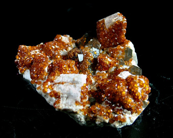 Spessartine on Quartz and Microcline - Wushan Spessartine Mine, Tongbei, Yunxiao Co., Zhangzhou, Fujian, China