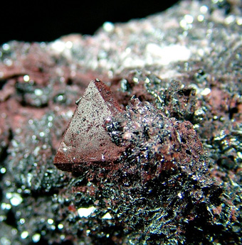Zunyite on Hematite - Qalat-e Bala salt dome, Bandar-Abbas County, Hormozgan, Iran
