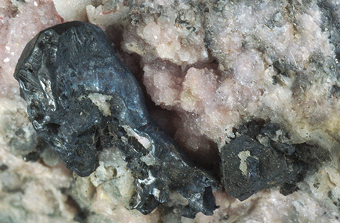 Acanthite, Pearceite, Rhodochrosite, Calcite - Uchucchacua mine, Oyon, Peru