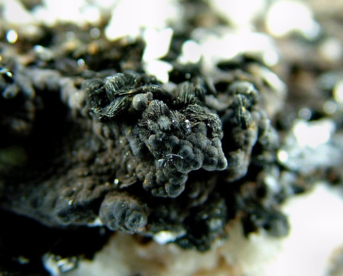 Manganite with Calcite - Agueglio Alp, Esino Lario, Lecco Province, Lombardy, Italy