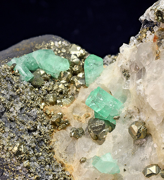 Beryl var. Emerald on Calcite with Pyrite - Coscuez Mine (Cosquez Mine), Muzo Municipality, Boyac� Department, Colombia